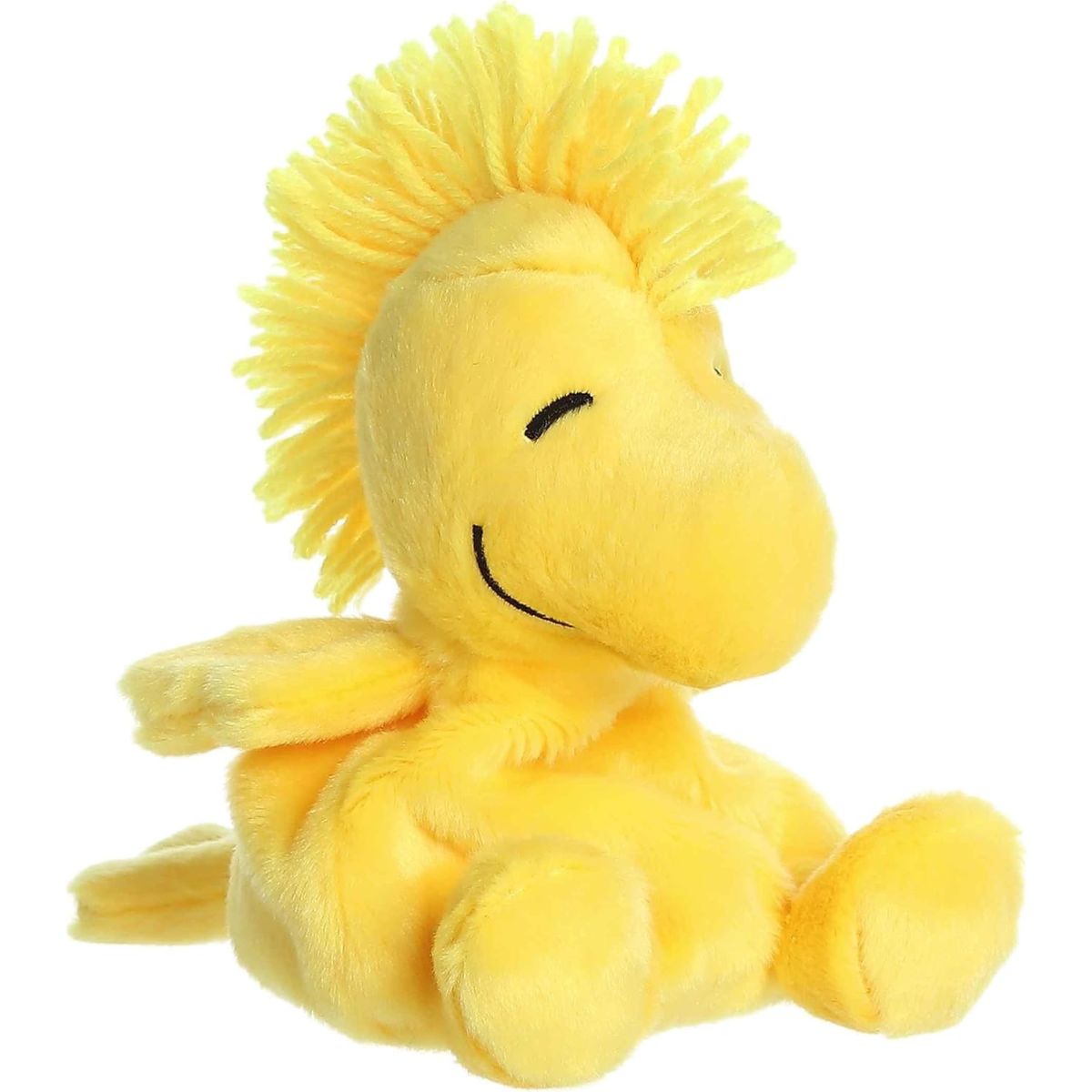 Aurora 5-inch Palm Pals Peanuts Woodstock plush toy sitting at an angle showing its bright yellow body, signature spiky head feathers, and happy stitched face.