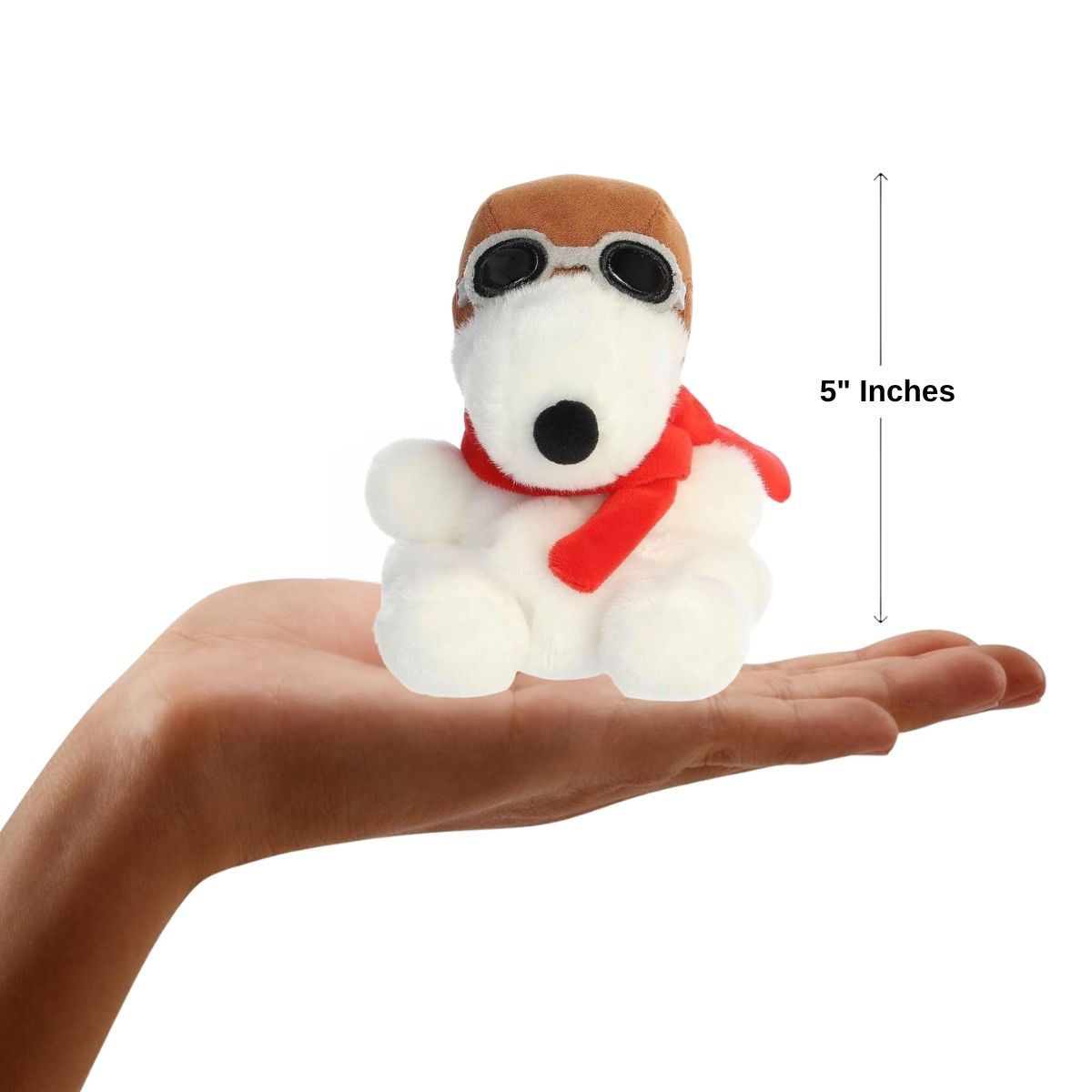 Dimension graphic showing the 5-inch Aurora Palm Pals Snoopy Flying Ace resting comfortably in a person's hand.