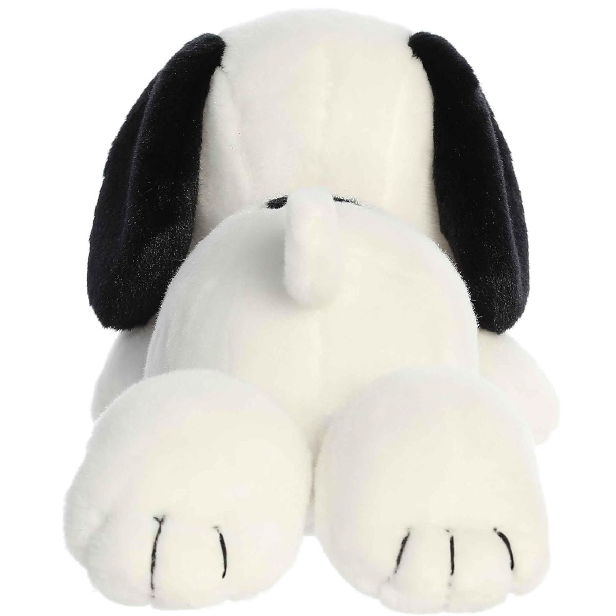 Direct back view of the Snoopy stuffed animal lying down, highlighting the bottom of his stitched paws and little white tail.