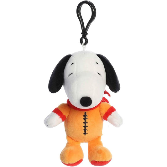 Straight front view of the Snoopy keychain plush highlighting his happy expression, black nose, and the black stitching on his orange suit.