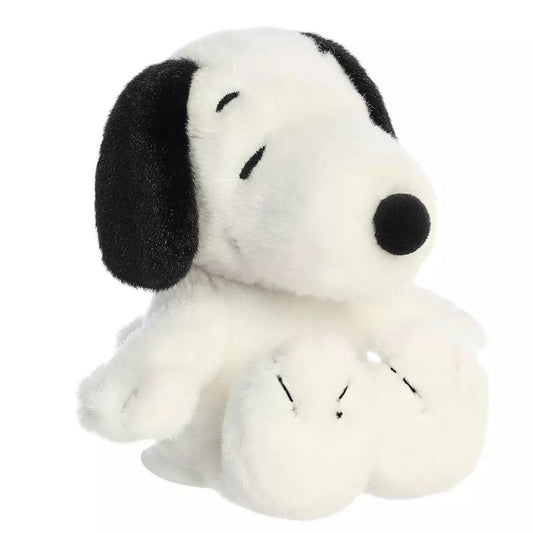 Angled front view of the 5-inch Aurora Peanuts Shoulderkins Snoopy stuffed animal sitting down.