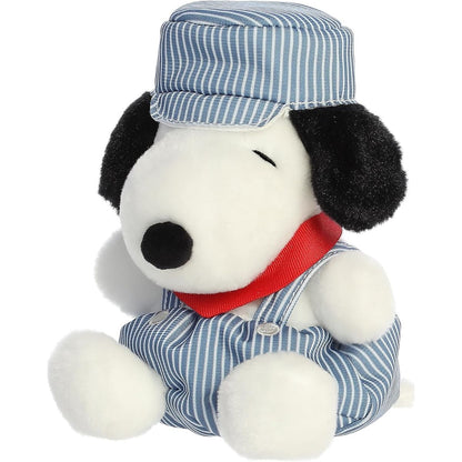 Slightly angled front right view of the Peanuts Train Engineer Snoopy Palm Pals plush sitting down.