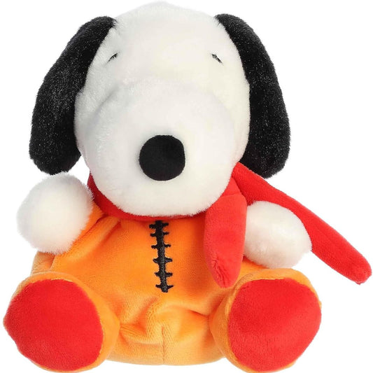 A close-up front portrait thumbnail of the Astronaut Snoopy plush showing his black button nose, closed eyes, and orange suit with black center stitches.