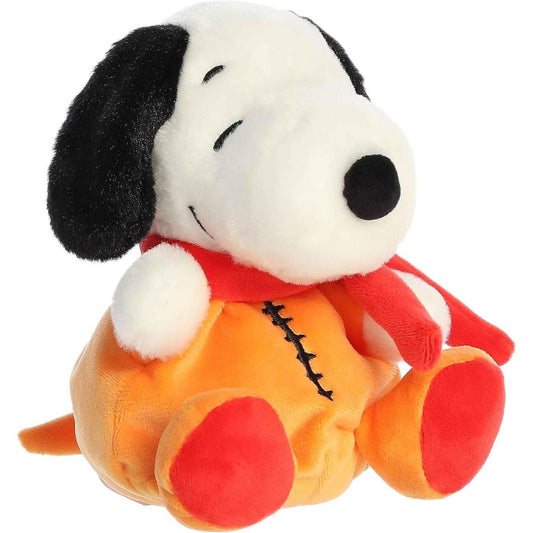 Aurora Palm Pals Astronaut Snoopy 5-inch plush stuffed toy sitting angled forward wearing an orange spacesuit and a red scarf.