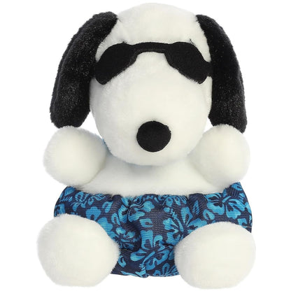 A close-up front portrait thumbnail of the Surfer Snoopy plush showing its black button nose, cool sunglasses, and blue shorts.