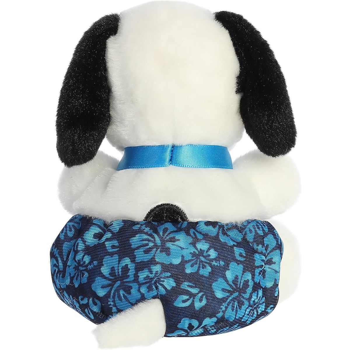 The rear thumbnail view of the white Aurora licensed Surfer Snoopy toy displaying his signature round black back spot peeking from his blue swim trunks.