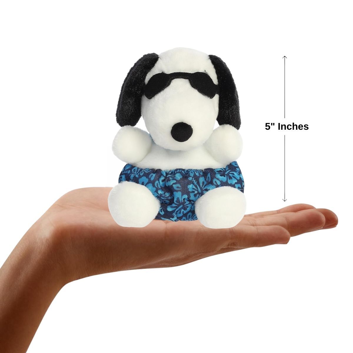 The miniature Surfer Snoopy plush sitting inside an open human hand displaying a 5-inch height indicator graphic.