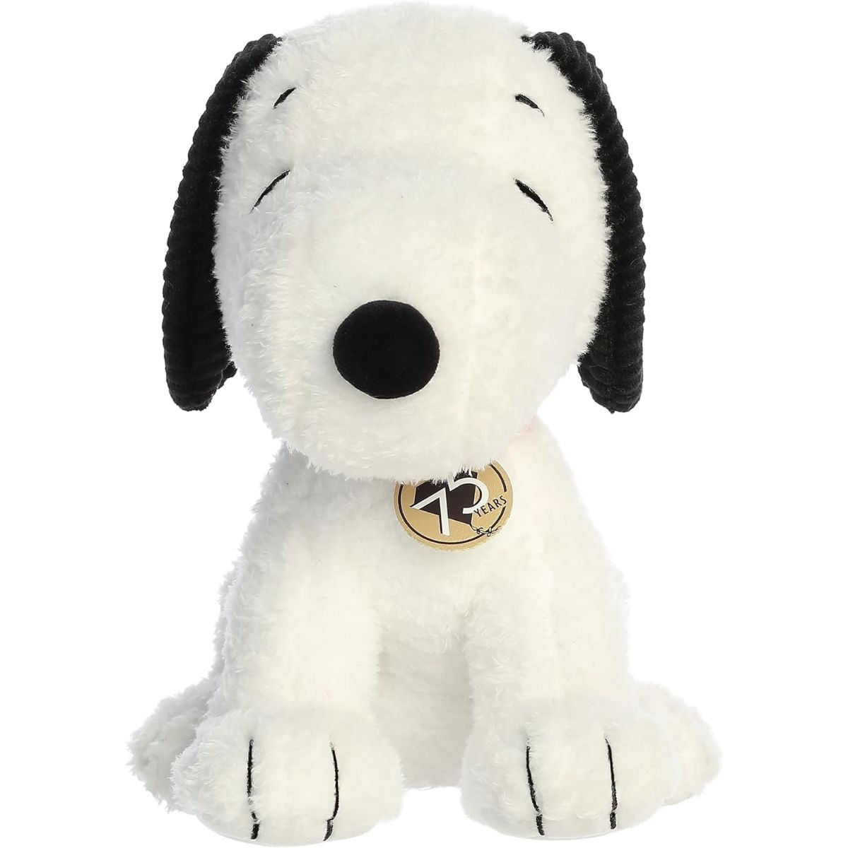 Straight-on front view of the soft Snoopy plush sitting upright, showing his textured black ears and 75th-anniversary tag.
