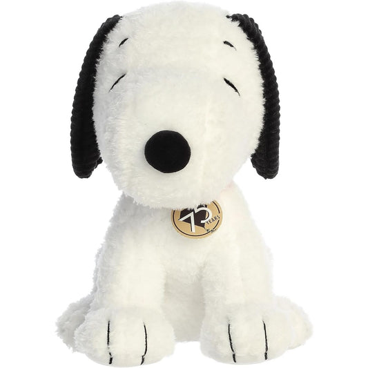 Straight-on front view of the soft Snoopy plush sitting upright, showing his textured black ears and 75th-anniversary tag.