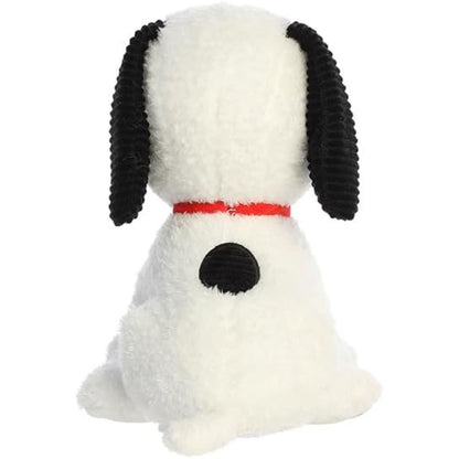 Direct back view of the Snoopy stuffed animal highlighting the black spot on his back, little white tail, and textured ears.