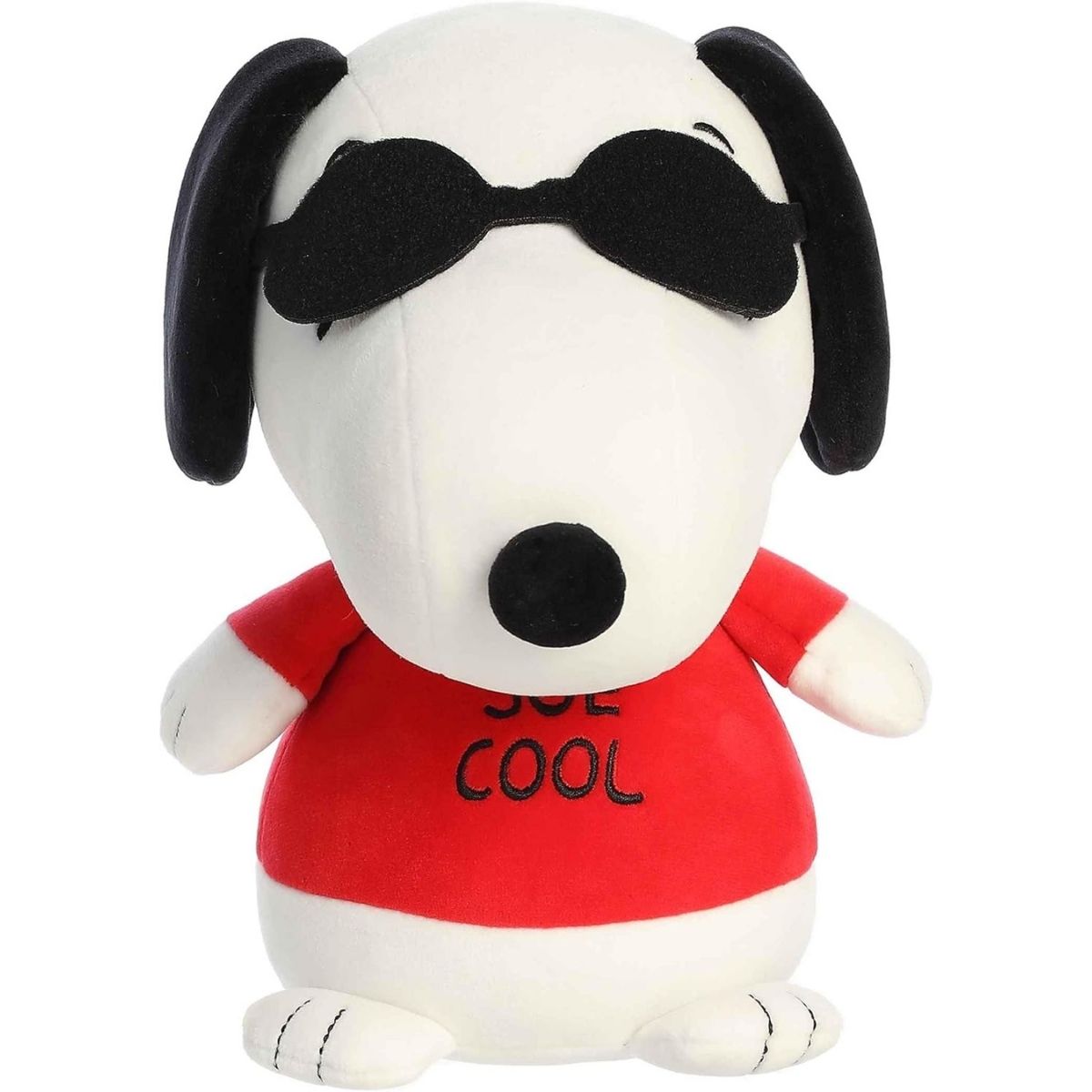Straight-on front view of the 8.5-inch Aurora Peanuts Squishy Joe Cool Snoopy stuffed animal wearing black sunglasses and a red shirt.