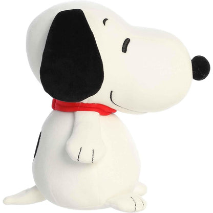 Side profile view of the white Squishy Snoopy plush highlighting his rounded belly, red collar, and sitting pose.