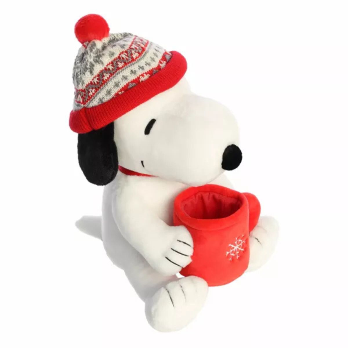 Top-down 3/4 angle thumbnail of the Snoopy winter plush highlighting the top of his pom-pom beanie and open mug design.