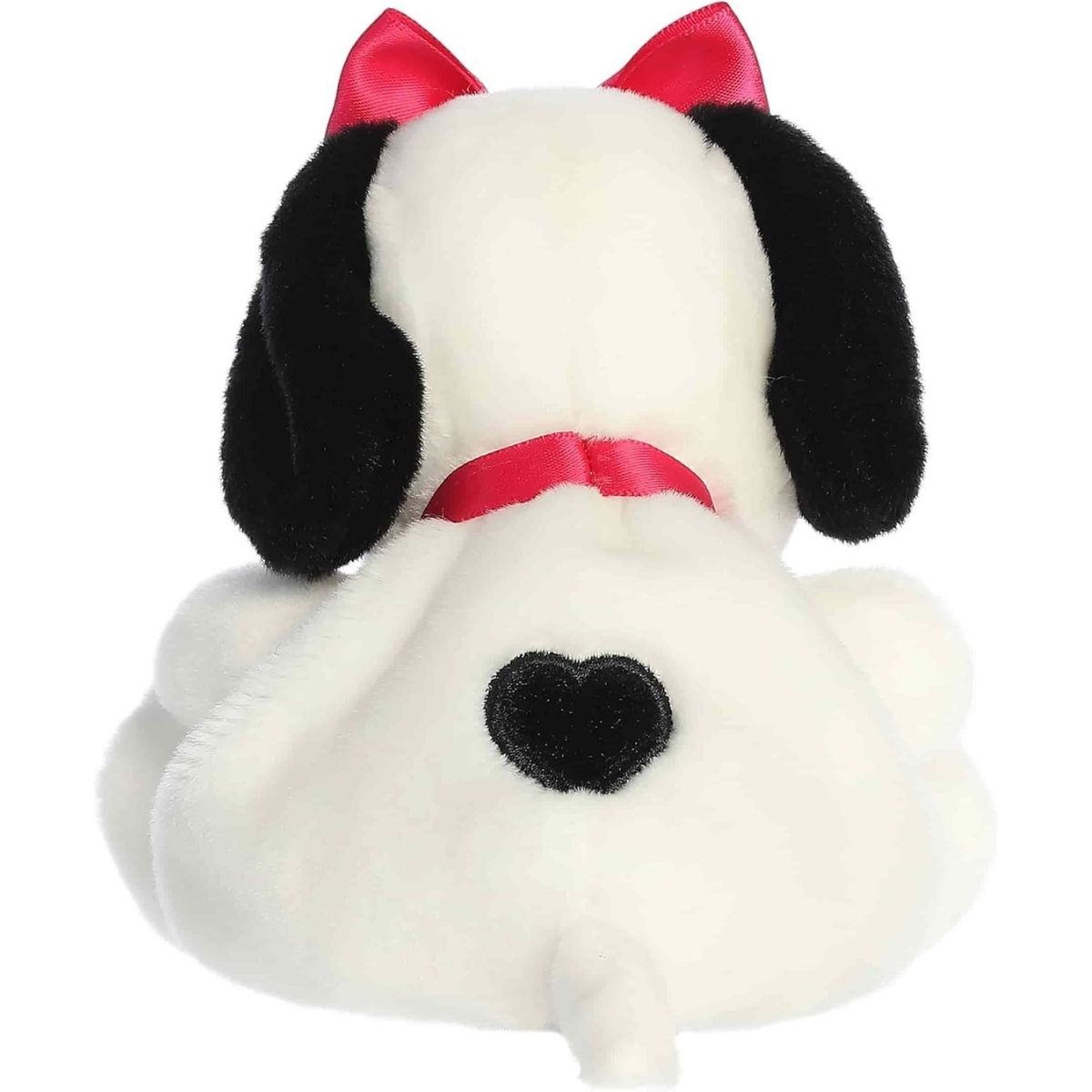 Back view of the Aurora Belle plush showcasing her white fur, black ears, pink bow, red collar, and the black spot on her back.