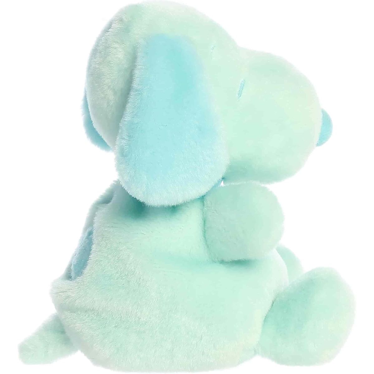 Angled side and back view of the cuddly Palm Pals Snoopy plush sitting comfortably, highlighting his floppy ear and back spot.