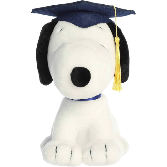 Direct front view of the soft white Snoopy stuffed animal sitting upright in his graduation gear.