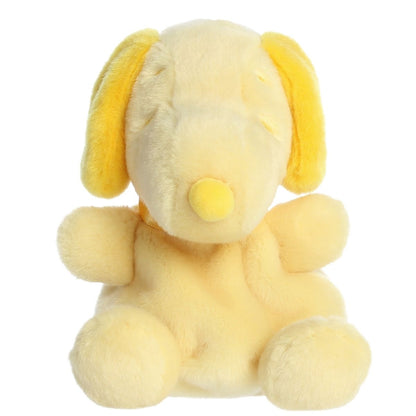 Straight front view of the sitting yellow Snoopy plush showing his bright yellow nose, collar, and sleepy embroidered eyes.