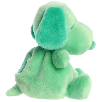 Side profile view of the Palm Pals Snoopy highlighting his plump shape, dark green floppy ear, and back spot.