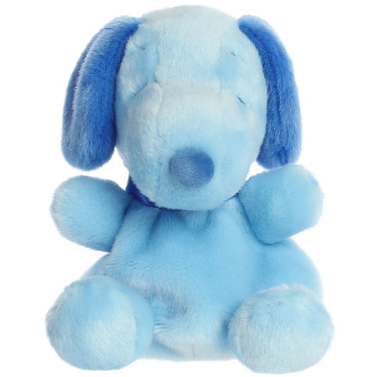 Close-up front view of the soft light blue Palm Pals Snoopy stuffed animal featuring dark blue ears and a closed-eye expression.