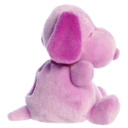Side profile view of the Palm Pals Snoopy highlighting his plump shape, dark purple floppy ear, and back spot.