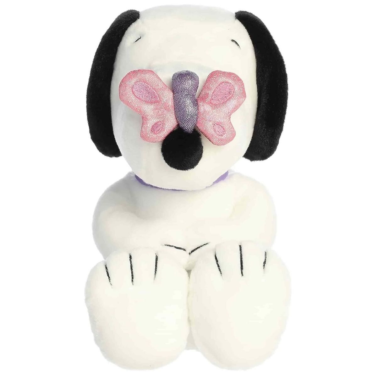 Straight-on front view of the soft Snoopy plush sitting upright with a pink butterfly covering his nose.