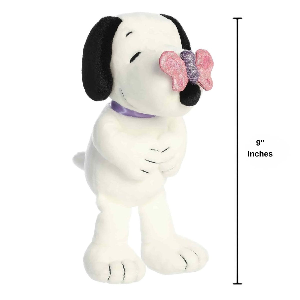 Straight-on front view of the 9-inch Aurora Peanuts Snoopy plush standing up tall with a 9-inch height measurement label.