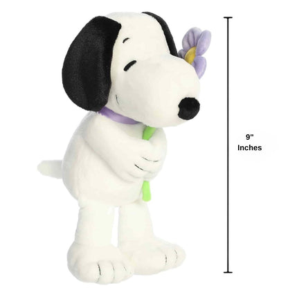 Dimension graphic showing the Aurora Peanuts Snoopy plush standing with a 9-inch height measurement label.