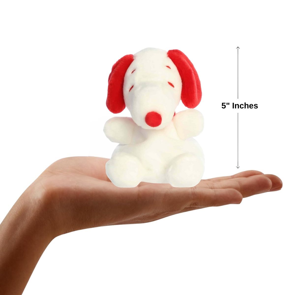 Sizing graphic showing the 5-inch Palm Pals Red and White Snoopy plush sitting perfectly in the palm of a hand to demonstrate its small scale.