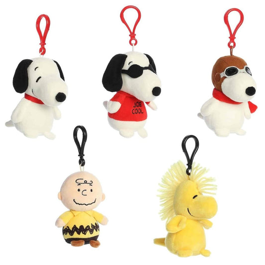 Front face view of the five collectible Aurora Peanuts plush clip-ons including Classic Snoopy, Joe Cool, Flying Ace, Charlie Brown, and Woodstock.