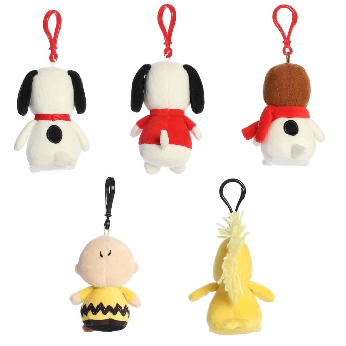 Back view of the Aurora Peanuts clip-on plush toys showing their soft backs, tails, and the sturdy plastic backpack clips.