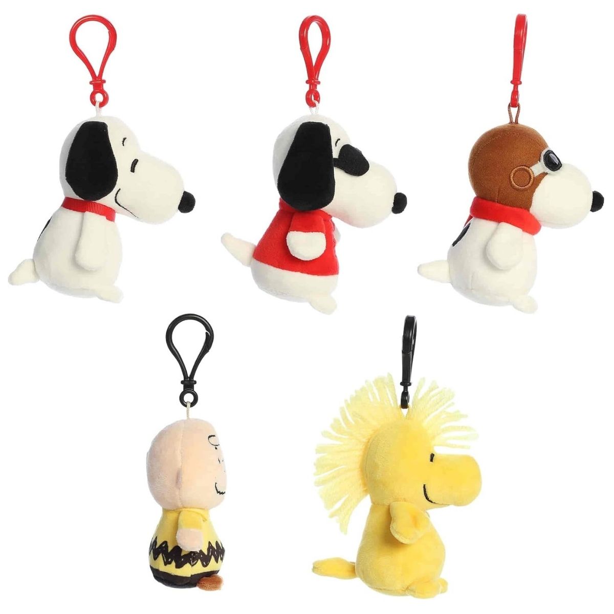 Side profile view of the five collectible Peanuts character clip-ons highlighting their perfectly squishy bodies.