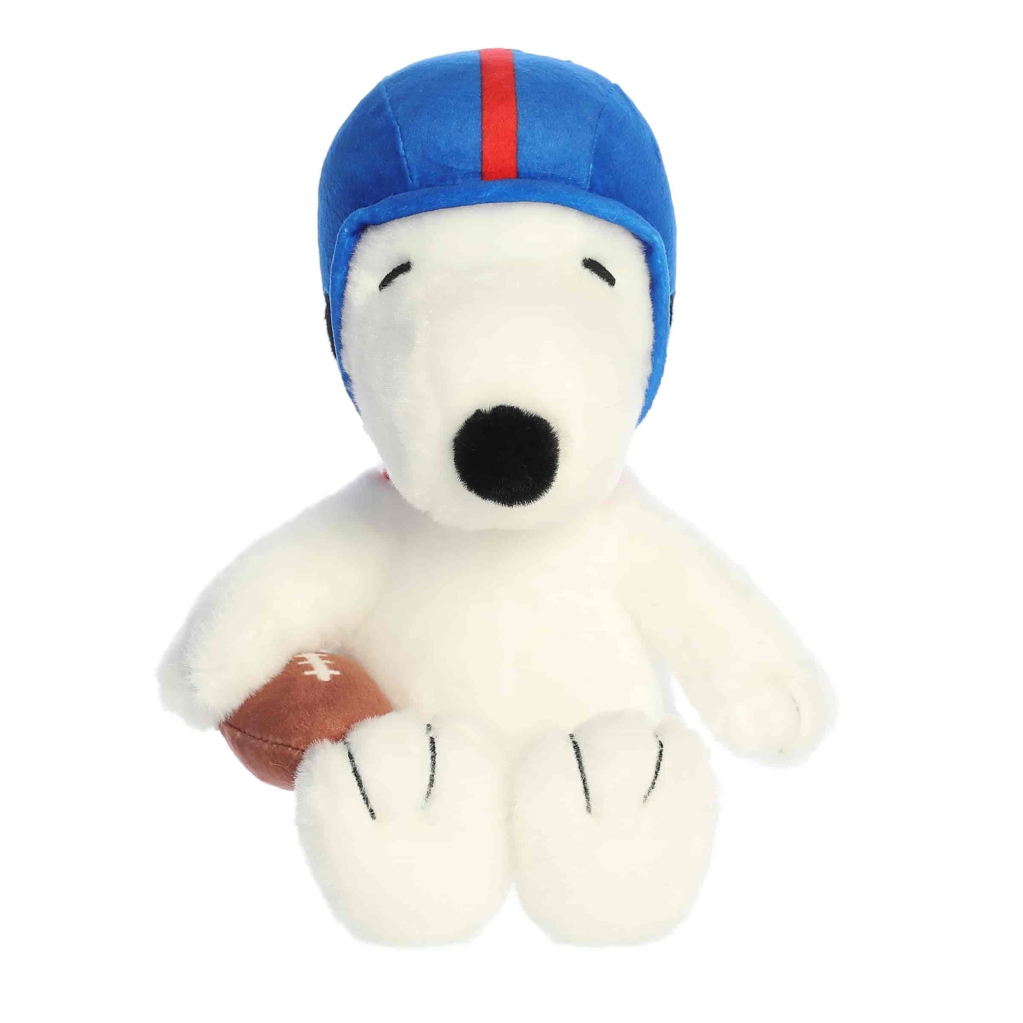 Straight front view of the sitting Snoopy stuffed animal showing his blue and red helmet, black nose, and brown football.