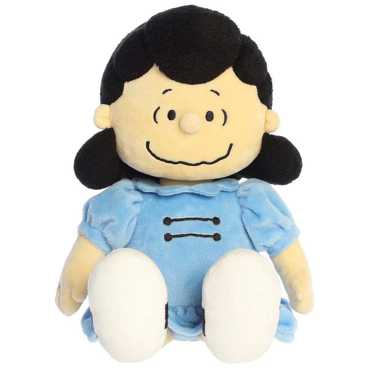 Straight-on front view of the soft Lucy plush sitting upright with her classic black hair and smile.