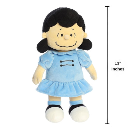 Dimension graphic showing the Aurora Peanuts Lucy plush standing with a 13-inch height measurement label.
