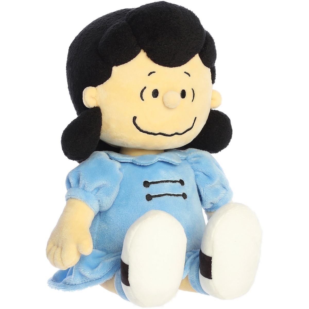 Angled front view of the 13-inch Aurora Peanuts Lucy stuffed animal sitting down in her blue dress.
