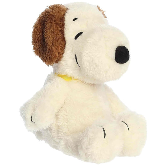Aurora 8-inch Peanuts Andy plush toy showing its shaggy cream fur, fluffy brown ears, yellow ribbon collar, and black nose.