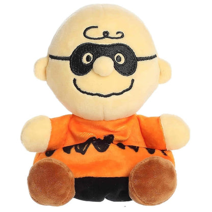 Front view thumbnail of the cute Masked Charlie Brown plush sitting straight, highlighting his wide stitched smile and symmetrical black eye mask.