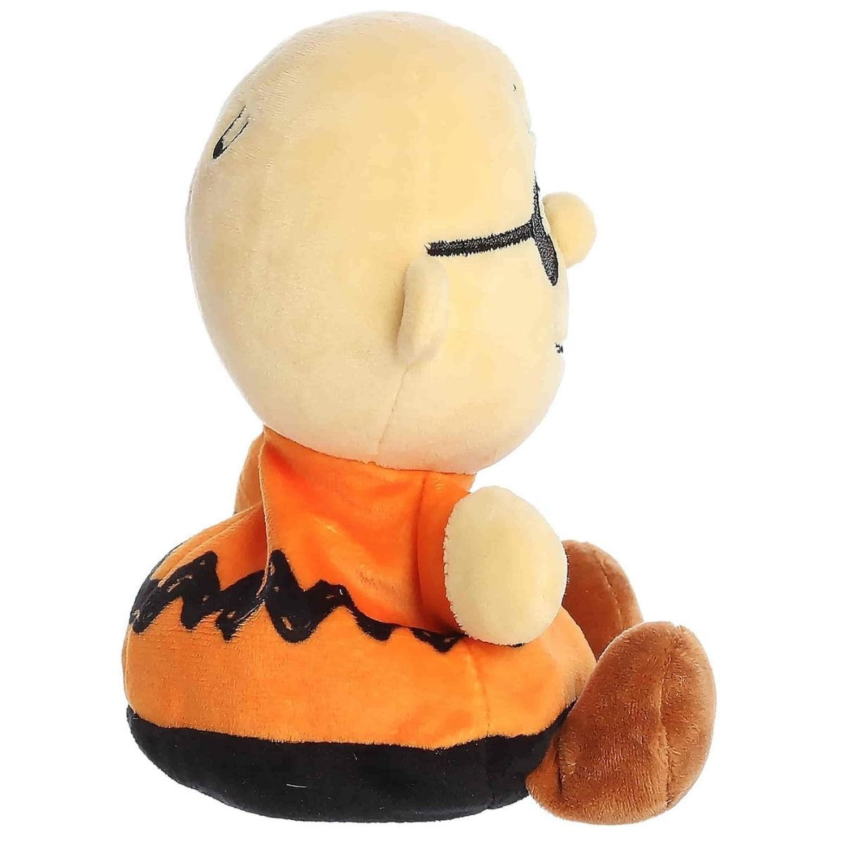 Side profile thumbnail of the mini Charlie Brown plush showcasing his round bald head, profile of the black mask, and soft seated posture.