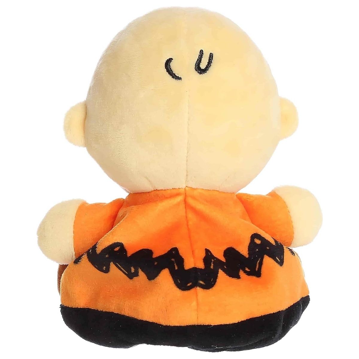 Rear thumbnail view of the Aurora Charlie Brown stuffed toy displaying his orange shirt with the continuous black zig-zag pattern and a tiny hair curl on the back of his head.