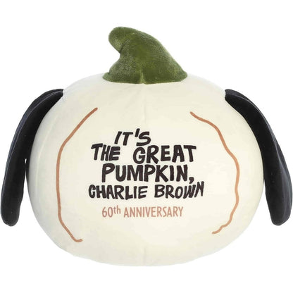 Back view thumbnail of the Aurora Peanuts plush displaying the embroidered commemorative text "It's The Great Pumpkin, Charlie Brown 60th Anniversary" in black and gold script.