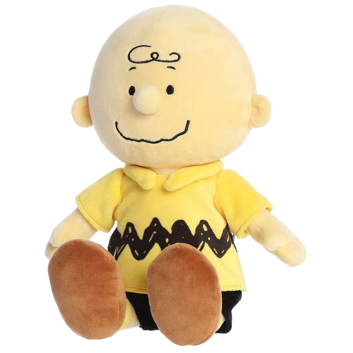 Slightly angled front right view of the smiling Charlie Brown plush sitting comfortably.