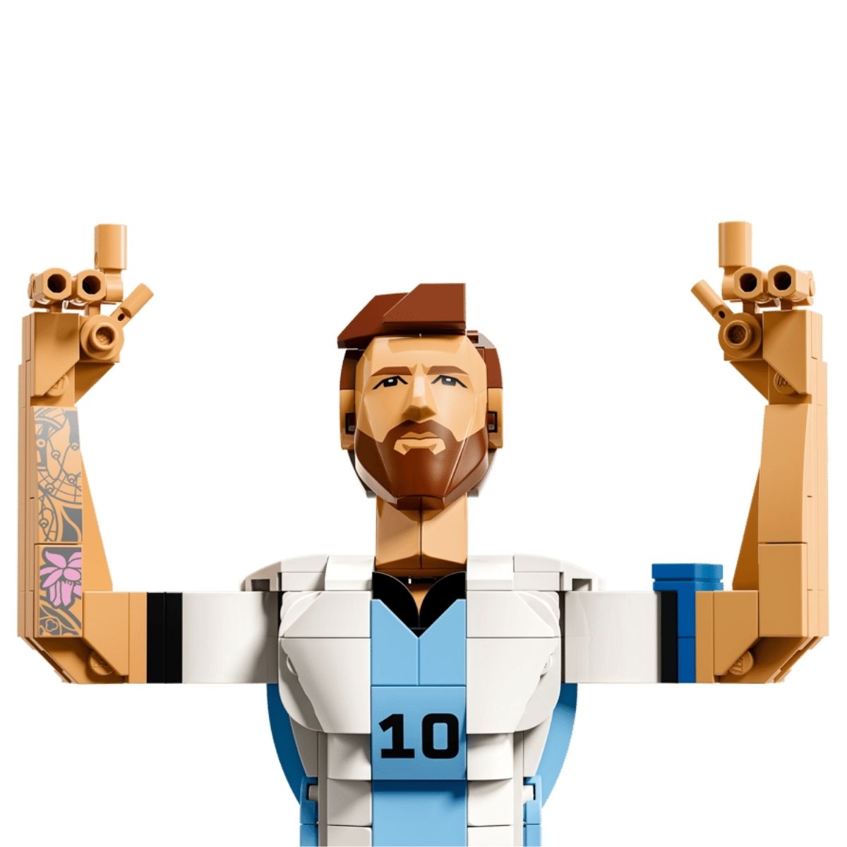 Close-up shot of the LEGO® Lionel Messi figure showing his detailed beard, jersey print, and tattooed arm details.