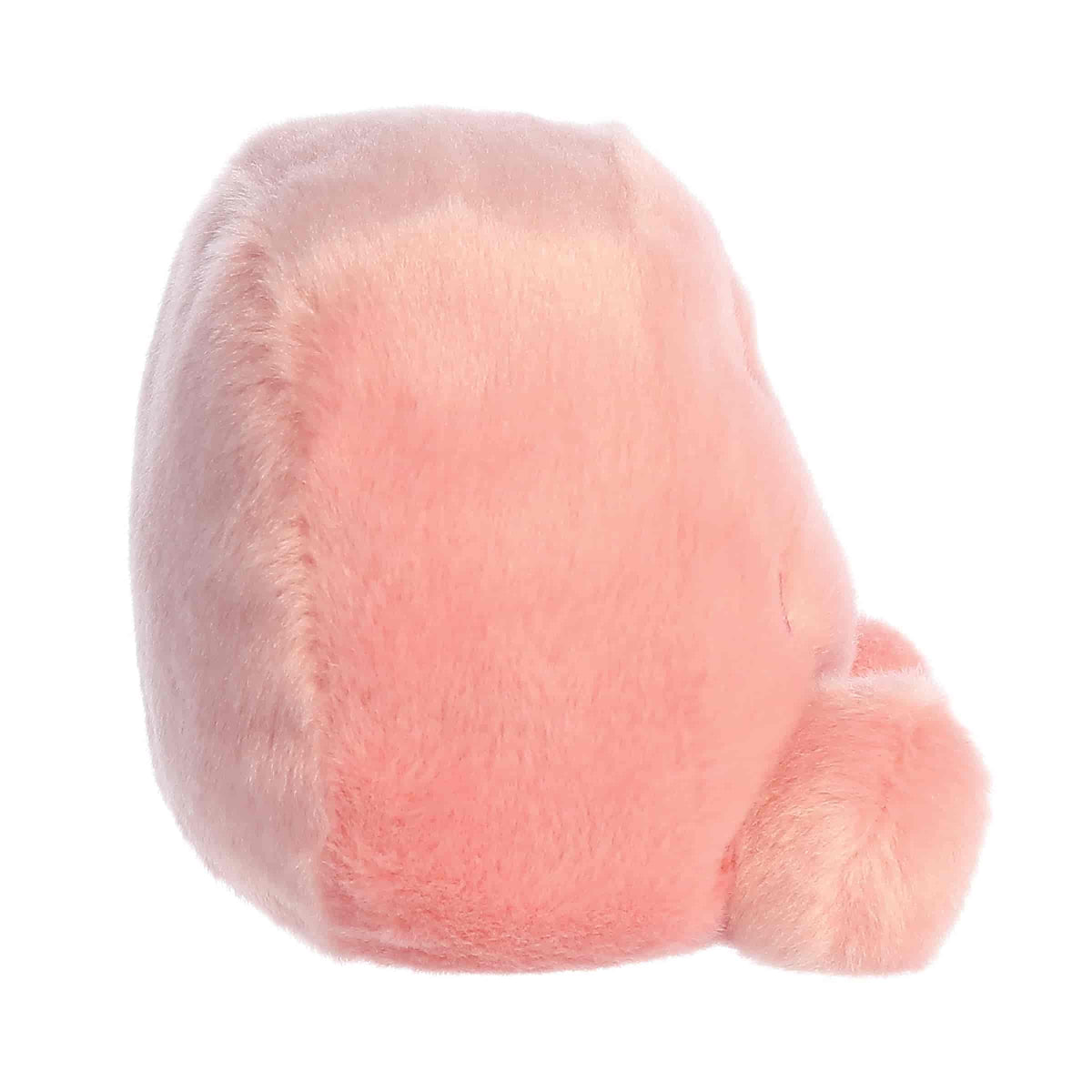 Side profile view of the Palm Pals SmileyWorld Zen highlighting its plump, rounded shape and soft plush feet.