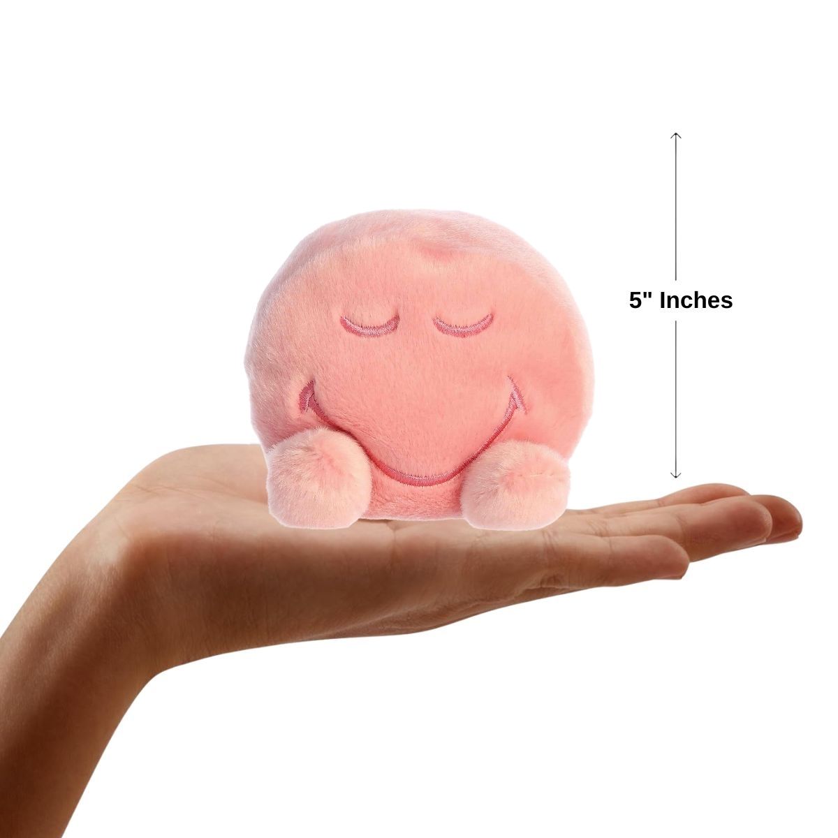 Sizing graphic showing the 5-inch Palm Pals SmileyWorld Zen plush sitting perfectly in the palm of a hand to demonstrate its small scale.