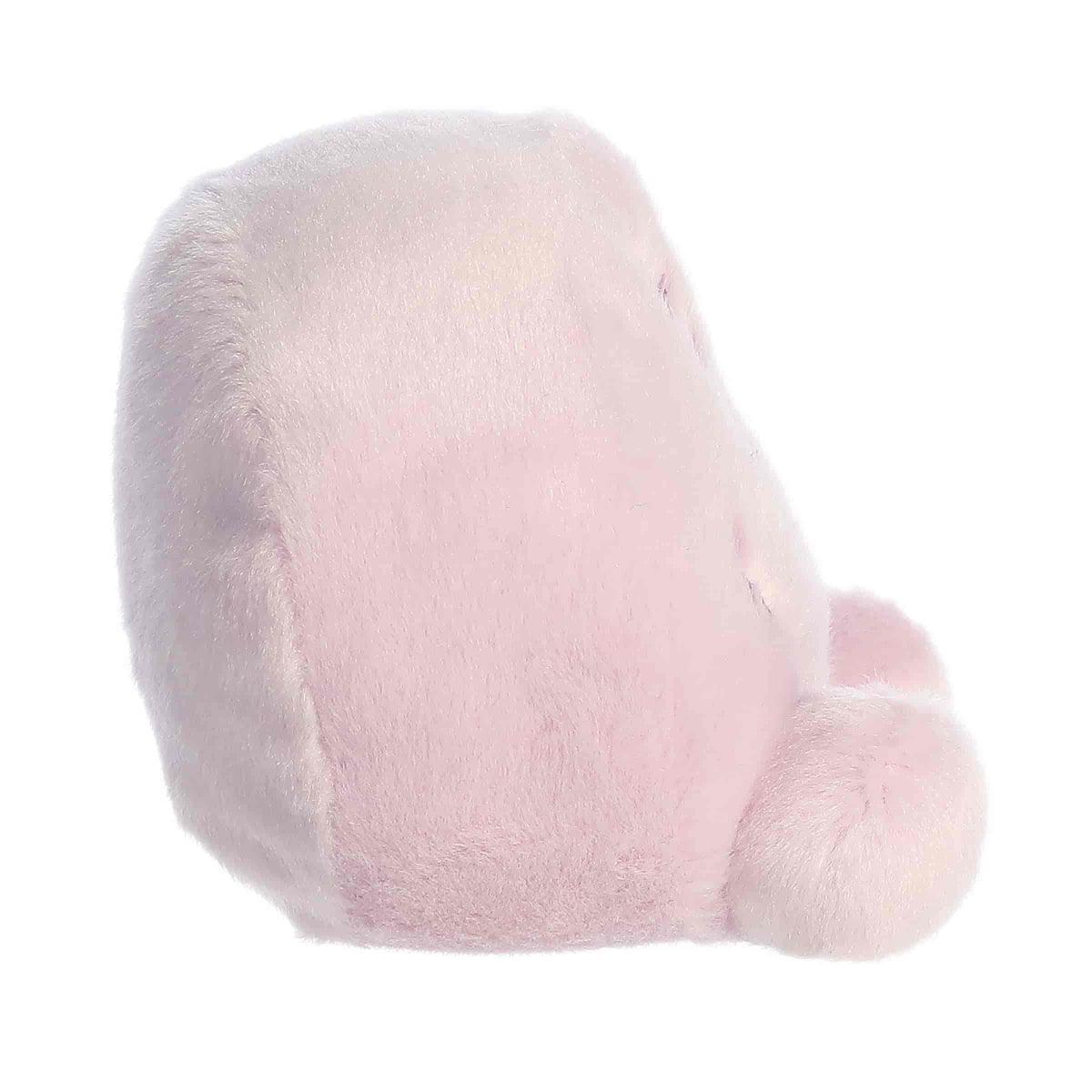 Side profile view of the Palm Pals SmileyWorld Vibe highlighting its plump, rounded shape and soft plush feet.
