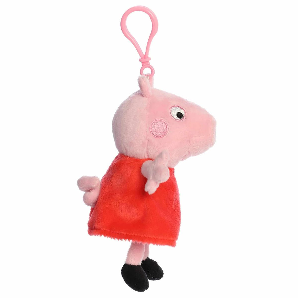 Side profile view of the Peppa Pig plush keychain highlighting her snout and classic red dress.