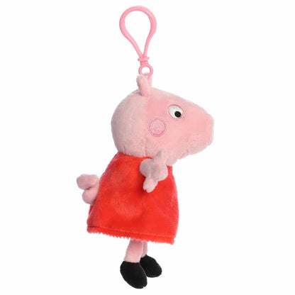 Side profile view of the Peppa Pig plush keychain highlighting her snout and classic red dress.