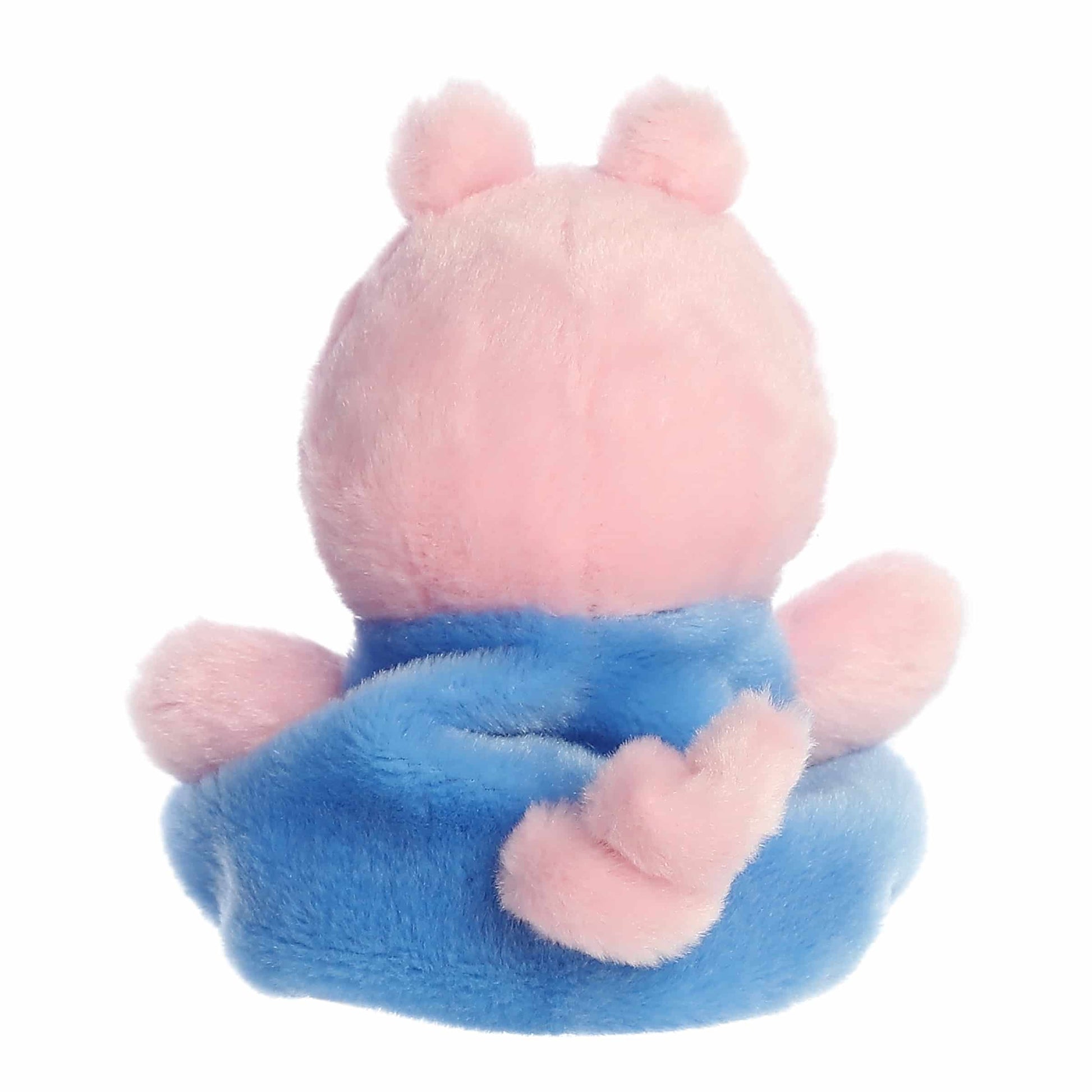 The rear thumbnail view of the pink and blue Aurora licensed toy displaying his soft plush back and small curly pink tail.