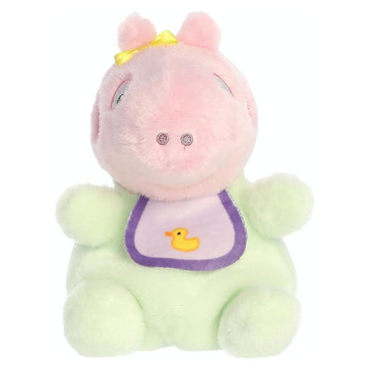 Straight-on front view of the soft Palm Pals plush Baby Evie featuring a yellow bow and a purple bib with a yellow duck.