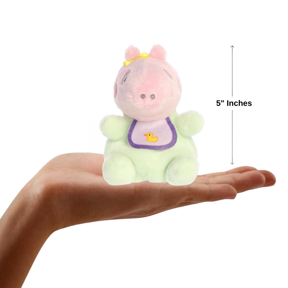 Dimension graphic showing the 5-inch Aurora Palm Pals Baby Evie resting comfortably in a person's hand.